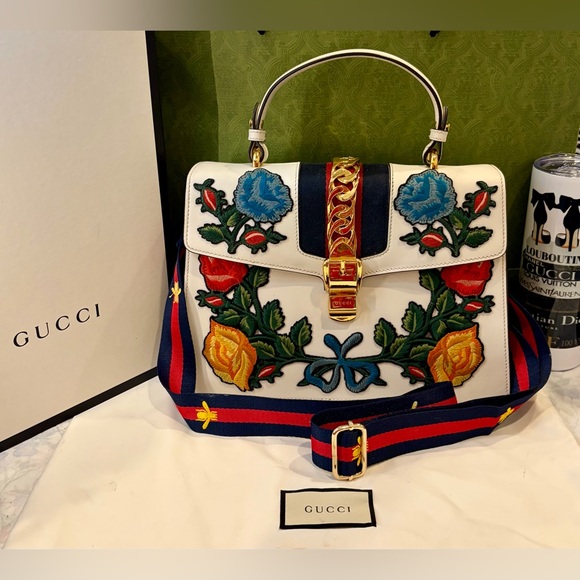 Gucci Handbags - 🌺💙💛 EUC GUCCI SYLIE MEDIUM FLORAL 
EMBROIDERED CALFSKIN LEATHER TOP HANDLE💛💙🌺